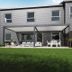 Pergola bioklimatyczna przyścienna z antracytowo-szarego aluminium – białe lamele – 4x8m Ombrea VS